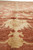 Angled field view showing faint storage crease line and ivory blossoms on rust ground