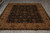 8x11 Jaipur Oriental rug photographed end-on with ivory fringe and camel gold palmette border