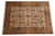 Full 9' x 12' Indian wool rug photographed flat, beige field framed by olive border