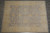 8'11" x 11'8" Chobi Ziegler rug laid flat on dark tile floor, grey field with gold florals