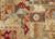 Detail of hand-knotted patchwork panels with serrated leaves, stepped medallion and terracotta border fragments