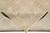 Folded back view revealing tight knot rows and the pattern legible from the reverse
