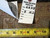Back tag reading Genuine Hand Woven Oriental Rug number 6278 with tape measure and child-labour-free label