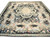 8 x 10 Chinese needlepoint Aubusson rug with black field, ivory medallion and floral garland border