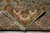 Folded corner revealing tight cotton foundation and clean even weave on the rug back