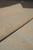 Rolled edge highlighting the natural wool pile depth and the blended gold and green coloring
