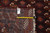 Back tag and tape measure confirming the width of this hand-woven Oriental wool rug