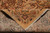 Folded corner revealing even hand-knotted back, cotton foundation and clean side finish