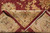 Folded corner revealing the fine hand-knotted back and cotton foundation of this Chobi rug