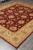 8'2 x 9'8 burgundy Chobi Zigler rug shown full length in the showroom