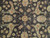 Close-up of vegetable dyed field showing gold rosette, coral blossoms and sage arabesque vines