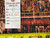 Back tag reading genuine hand woven Oriental rug number 6492 beside a tape measure