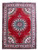 8'11" x 12'5" red Persian Tabriz rug with teal floral medallion and ivory spandrels
