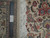 Ruler and authentic hand-knotted tag beside the dense reverse, showing fine knots per square inch