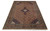 Angled view of hand-knotted wool Ardebil rug showing salmon field, blue borders and ivory corner spandrels