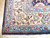 Corner detail showing ivory main border, light blue guard stripes and hand-knotted Tabriz floral drawing