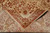 Folded corner revealing the tight hand-knotted wool back and even knots per square inch