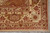 Corner detail with ivory border, olive cartouche palmettes and hand-knotted ivory cotton fringe