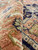 8x10 Indian Serapi rug folded to show dense fine wool pile and rust tones