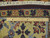 Back of 8x10 Indian rug with ruler showing hand-knotted rows on cotton foundation