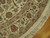 Border detail showing rose inner stripe, sage main border, clean selvage and ivory fringe