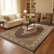 Beige living room with cream sofa showing this 7x10 black and ivory Mahi rug