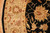 Detail of beige border band with brick red flowers beside a gold field blossom