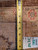 Tape measure on the back of the rug beside a handwritten tag marked 5361