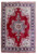 Full overhead view of 6'7" x 9'11" Persian Tabriz rug, red field, navy floral border
