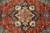 Close-up of the eight pointed medallion with ivory palmettes, olive leaves and rose colored center