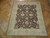 8'2" x 9'9" Chobi Ziegler rug shown on herringbone parquet floor in a bright room