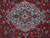 Detail of medallion core showing rosettes, arabesques and shaded wool pile in an 8x11 Tabriz