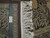Ruler and authentic hand knotted tag beside the braided fringe of this wool rug