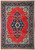 Coral red Persian Sarouk rug with navy floral medallion, ivory spandrels and deep navy border