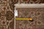 Back of 8x10 Jaipur rug with tape measure and original hand-woven Oriental rug tag