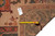 Back of rug with tape measure and tag marked F-4441, 8'10" x 10'7" size