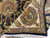 Folded corner reveals dense lustrous wool pile, ivory border palmette and clean cotton fringe