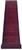 Full runner shown vertically, red field with navy panels and repeating diamond medallions down the centre
