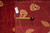 Tape measure and seller tag marked F-3183 laid across the beige flowers and ground