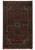 Full overhead view of the burgundy Tabriz rug with ivory starburst medallion and dark border