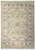 Full overhead view of the light green Ziegler rug with ivory floral border and fringed ends
