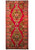 Full overhead view of the long red Heriz rug with two olive medallions and panelled border