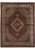 Full front view of the rug flat, dark Herati field, lobed medallion, wide ivory border