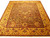 Full view of the brown and gold Indian Jaipur rug showing all-over floral field and wide border