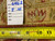 Inventory tag marked rug no. 6462, size 8 x 10, with a tape measure on the weave