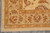 Corner detail of main border, guard stripes and the fringe along the end edge