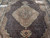 Upper half of the rug from floor level, medallion, pendant and dark field in perspective