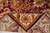 Corner folded back to show the reverse knotting beside the pile face and fringe