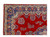 Corner detail of blue palmette border, ivory guard stripes and red field flower sprays