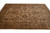 9' x 12' Indian wool rug viewed lengthwise, dense scrolling vine field and floral border
